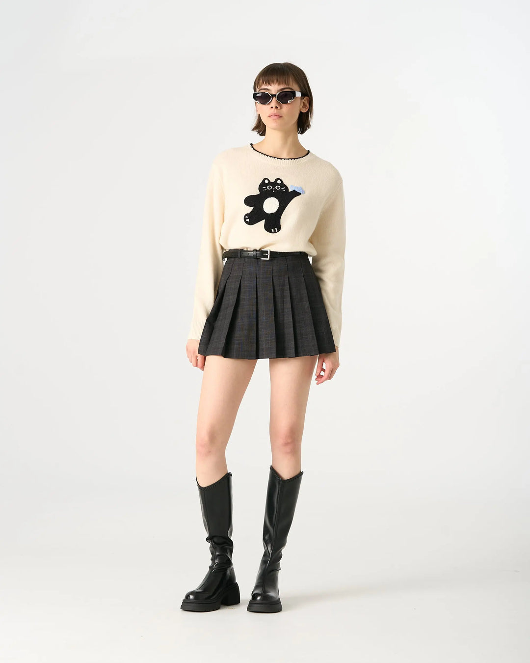 An image of a   20584 Pleated Mini Skirt by  Mirra Masa