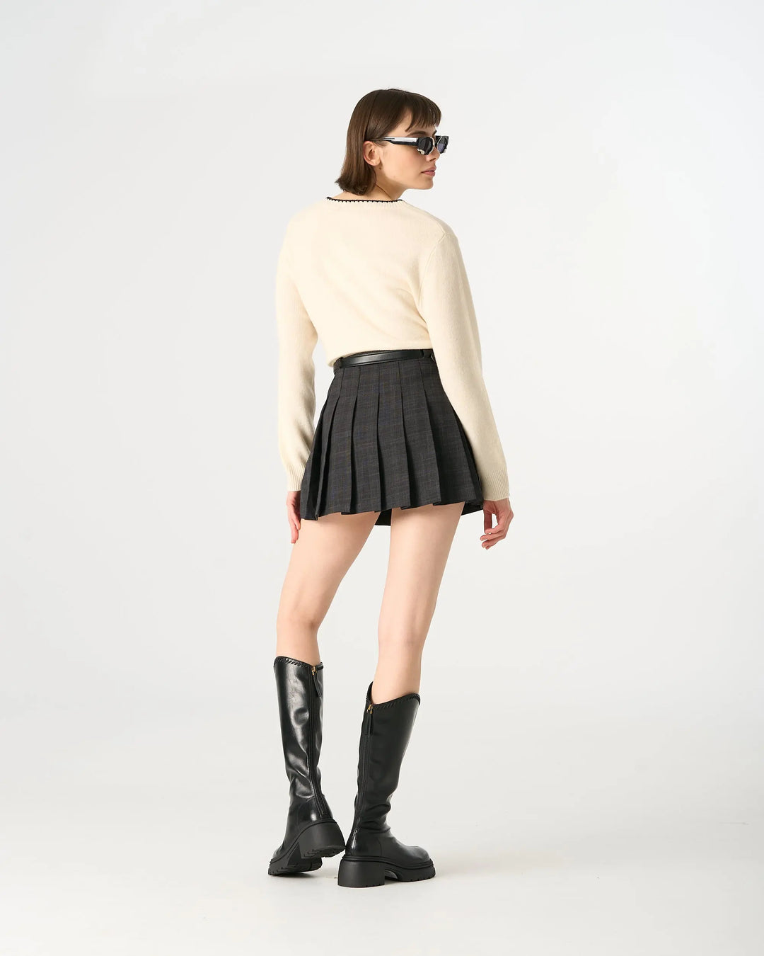 An image of a   20584 Pleated Mini Skirt by  Mirra Masa