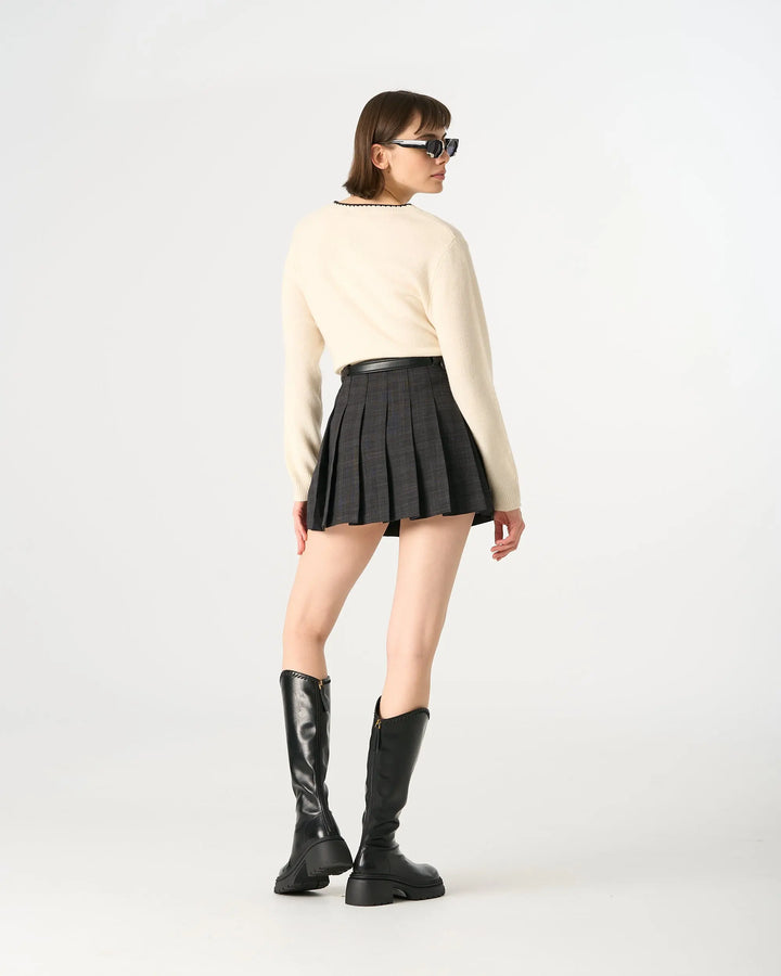 An image of a   20584 Pleated Mini Skirt by  Mirra Masa
