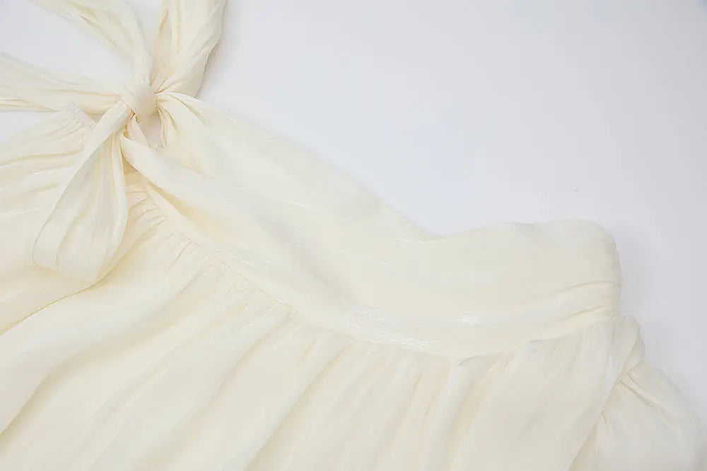 An image of a   21021 Asymmetrical Plisse Tie Blouse by  Mirra Masa