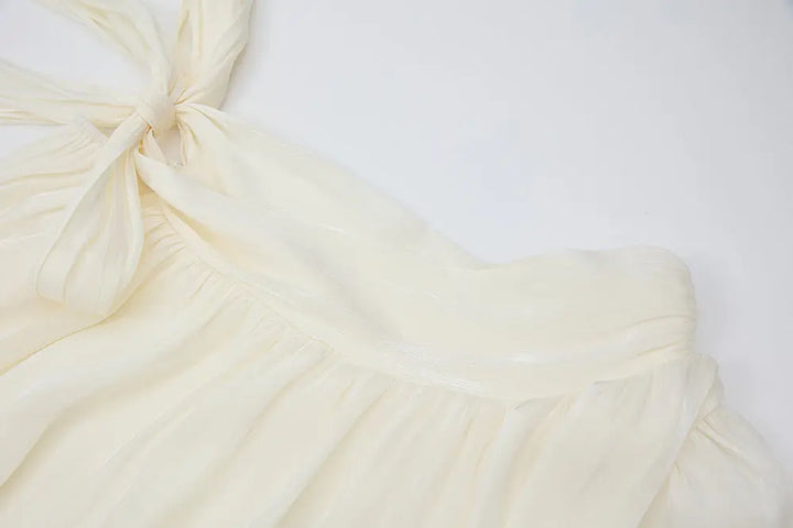 An image of a   21021 Asymmetrical Plisse Tie Blouse by  Mirra Masa