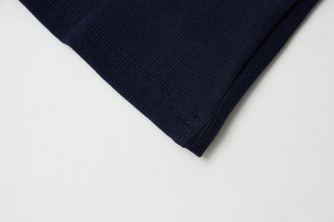 An image of a   21134 Padded Slip Top with Buttons by  Mirra Masa