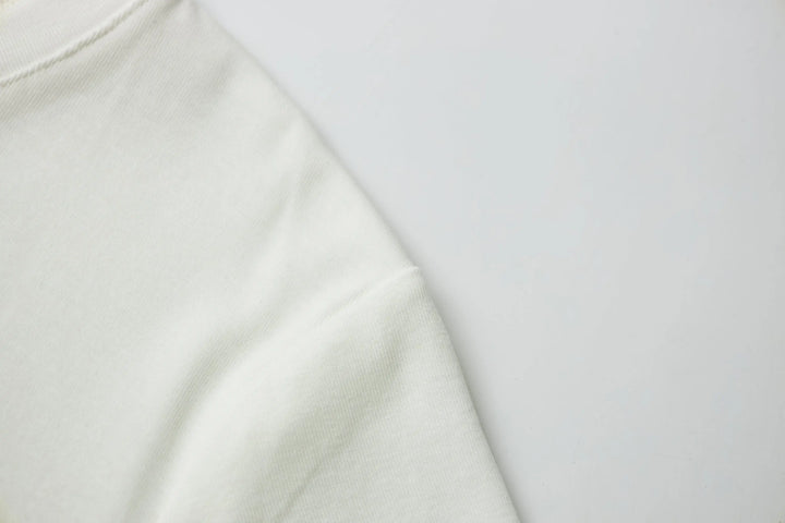 An image of a   21221 Graphic T-Shirt by  Mirra Masa