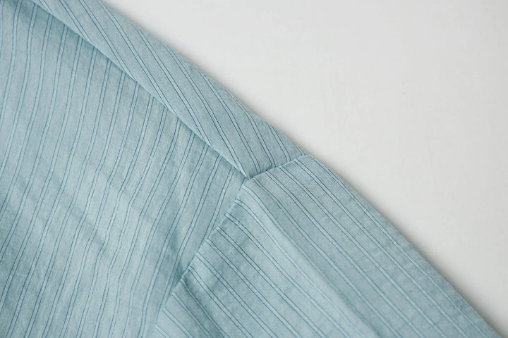 An image of a   21485 Cropped and Layered Shirt by  Mirra Masa
