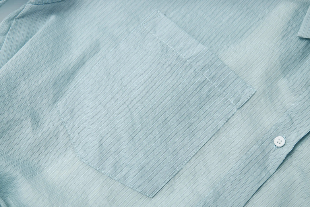An image of a   21485 Cropped and Layered Shirt by  Mirra Masa