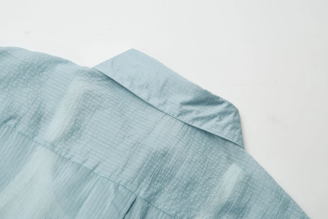An image of a   21485 Cropped and Layered Shirt by  Mirra Masa