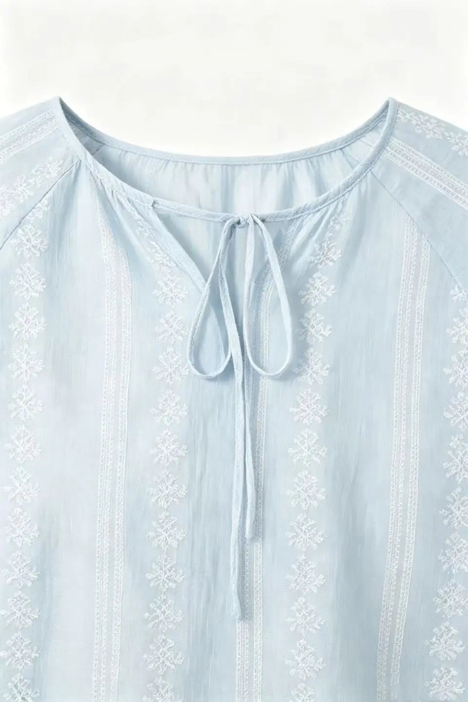 An image of a   21498 Meadow Tie Blouse by  Mirra Masa