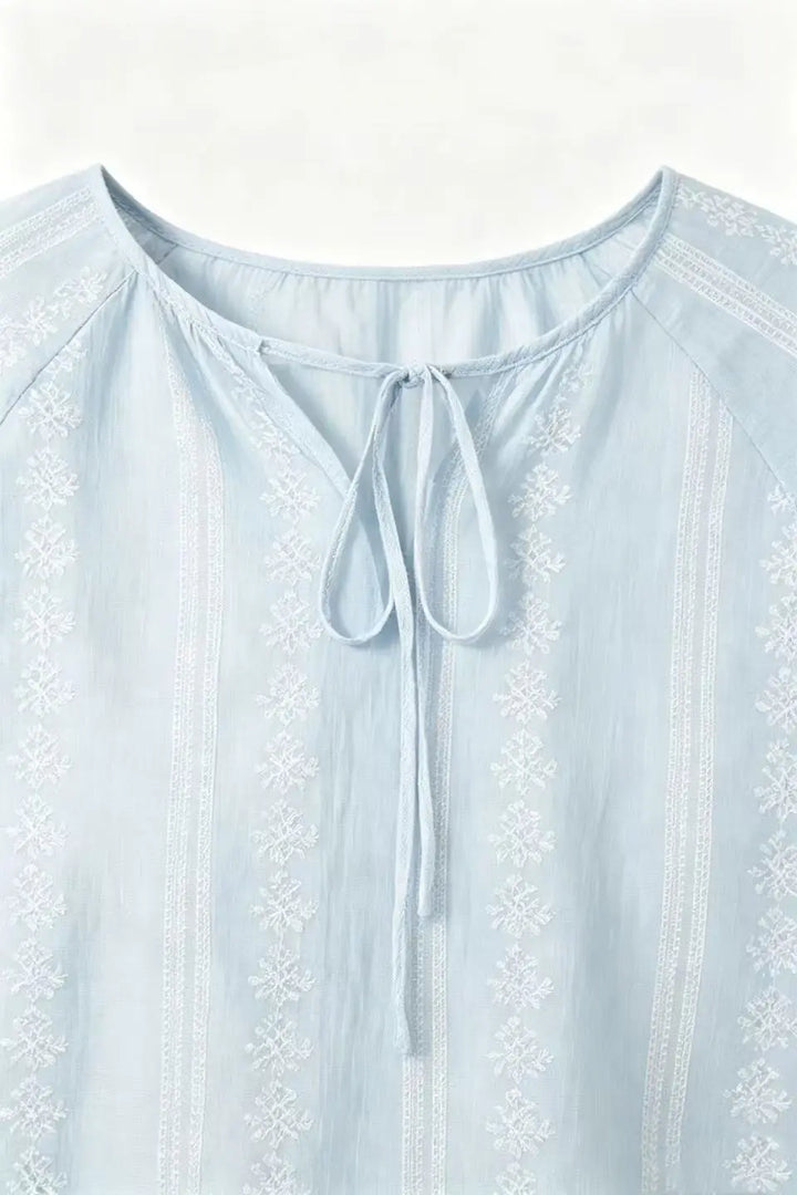 An image of a   21498 Meadow Tie Blouse by  Mirra Masa