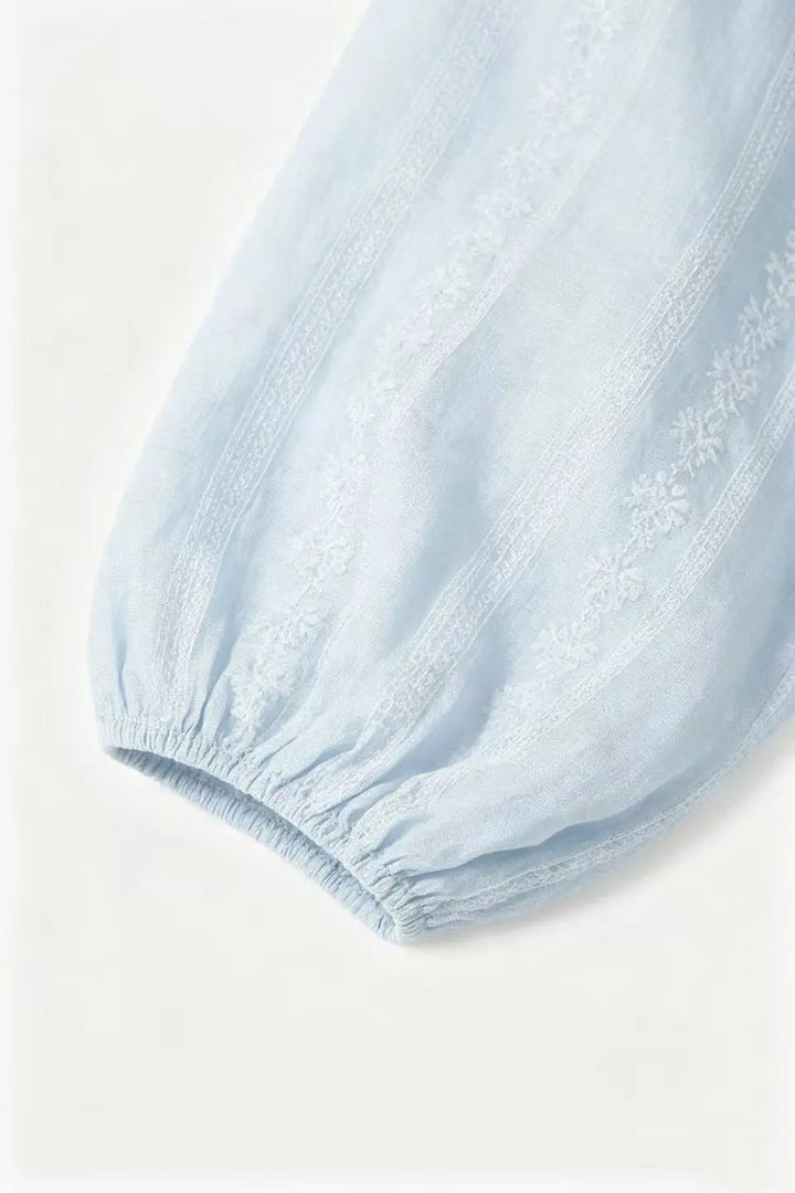 An image of a   21498 Meadow Tie Blouse by  Mirra Masa