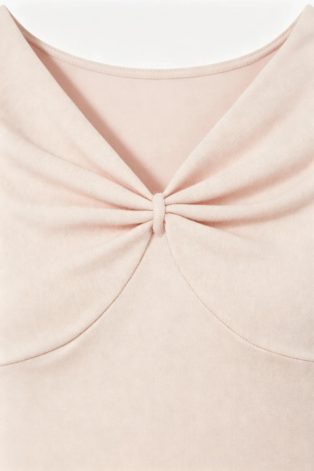 An image of a   21522 Twist Front Cap Sleeve Tee by  Mirra Masa
