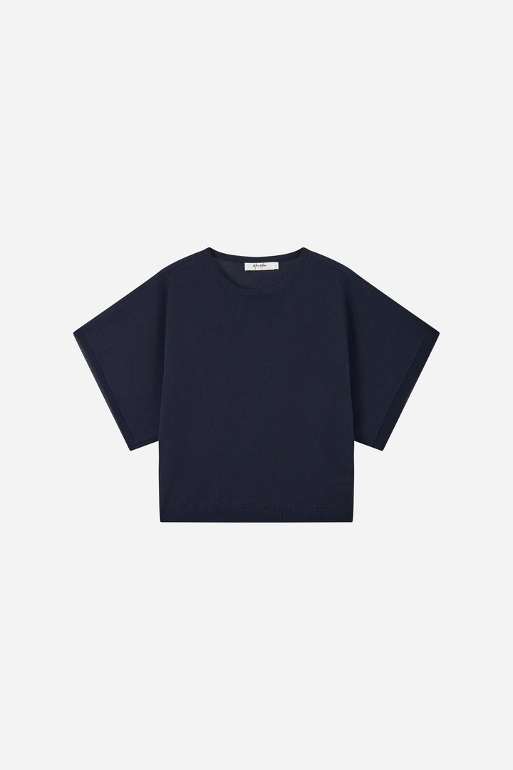 An image of a   21590 Dolman Short Sleeve Knit by  Mirra Masa