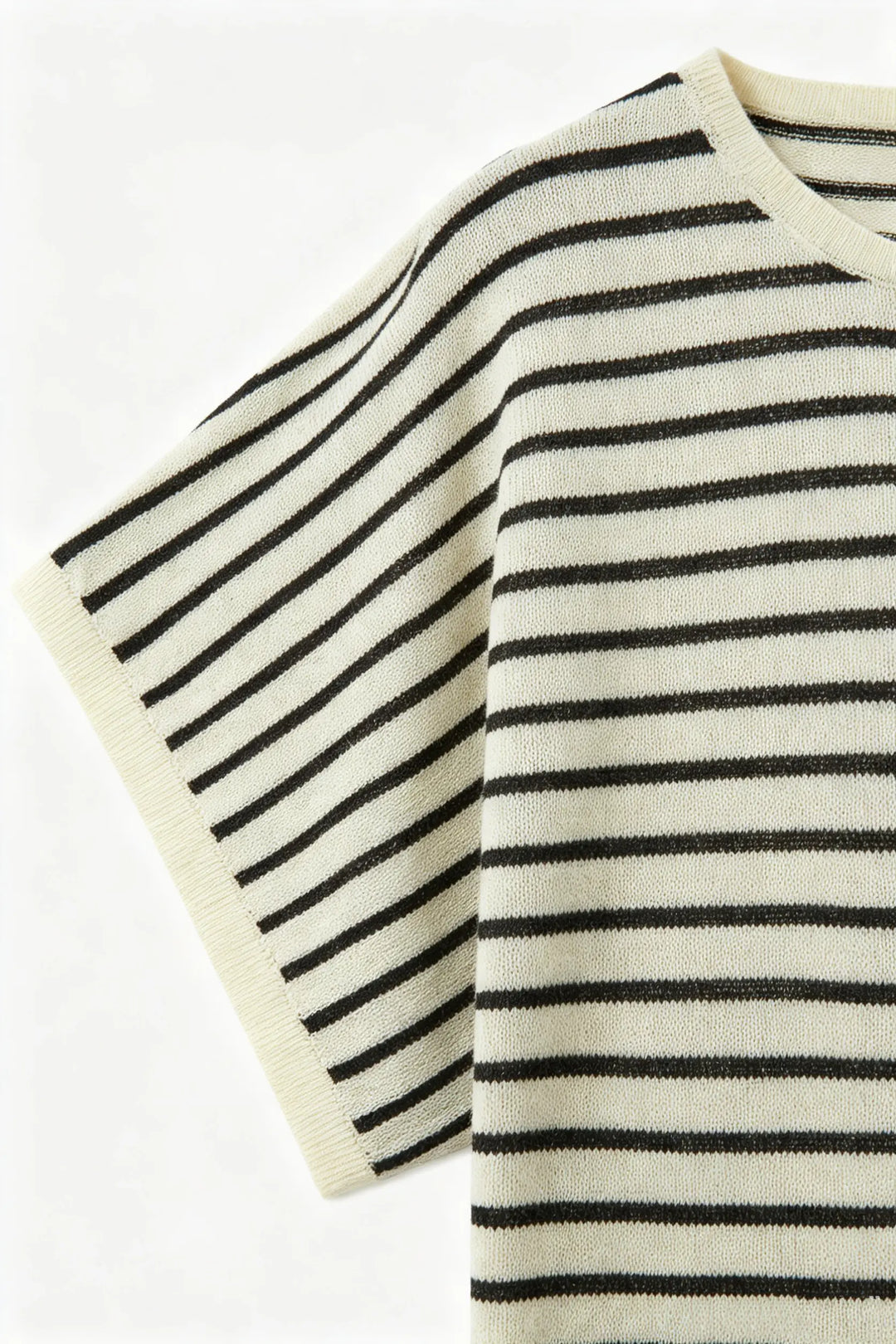 An image of a   21590 Dolman Short Sleeve Knit by  Mirra Masa
