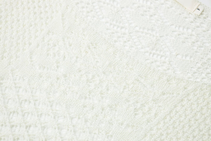 An image of a   21653 Breezy Layering Knit Top by  Mirra Masa