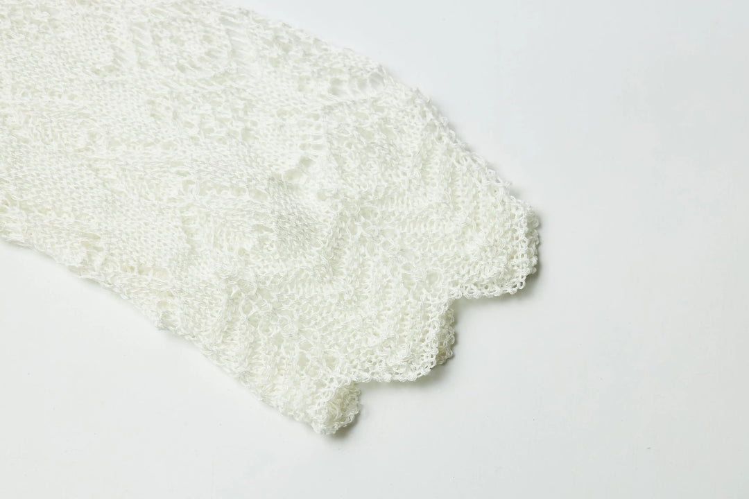 An image of a   21653 Breezy Layering Knit Top by  Mirra Masa