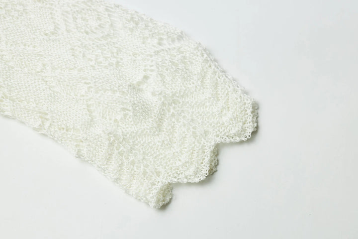 An image of a   21653 Breezy Layering Knit Top by  Mirra Masa
