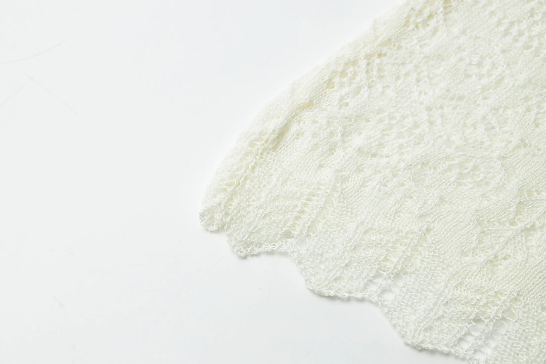 An image of a   21653 Breezy Layering Knit Top by  Mirra Masa
