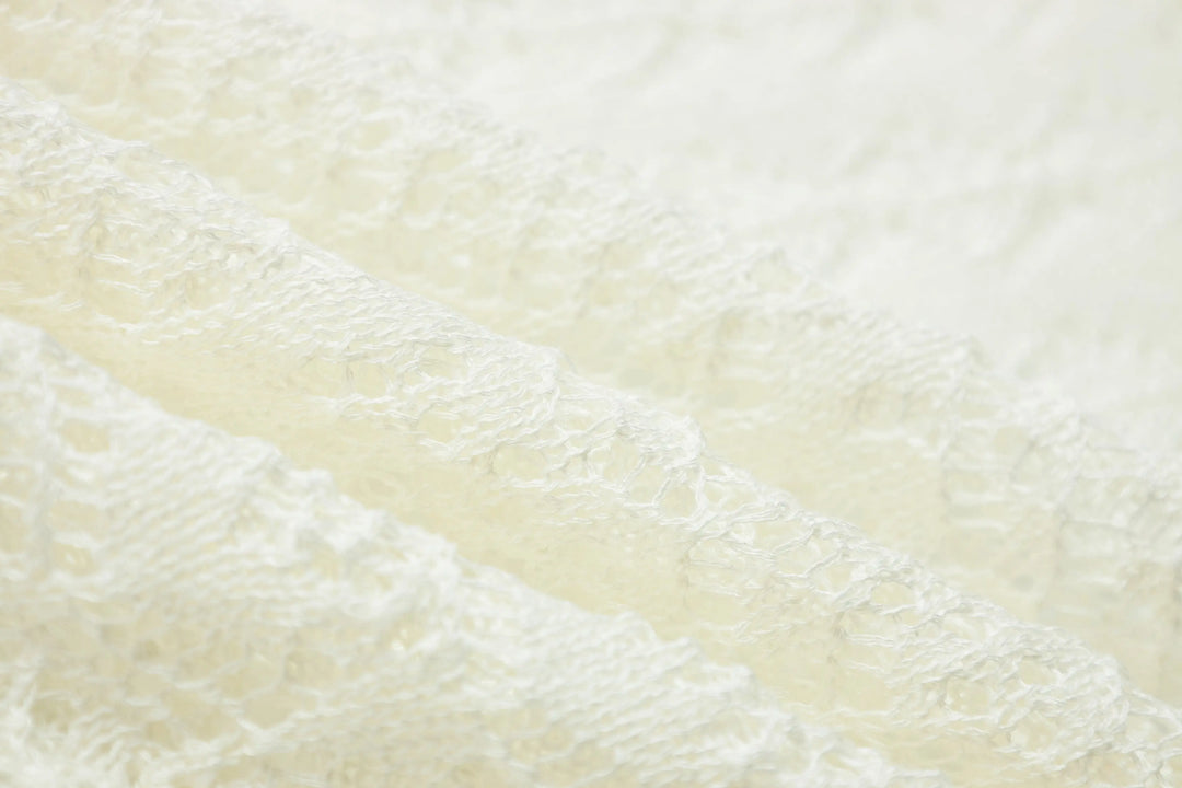 An image of a   21653 Breezy Layering Knit Top by  Mirra Masa