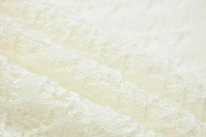 An image of a   21653 Breezy Layering Knit Top by  Mirra Masa