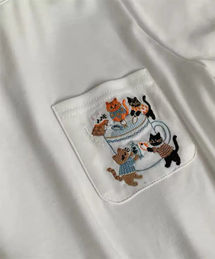 An image of a   21664 Teacup Cat Tee by  Mirra Masa