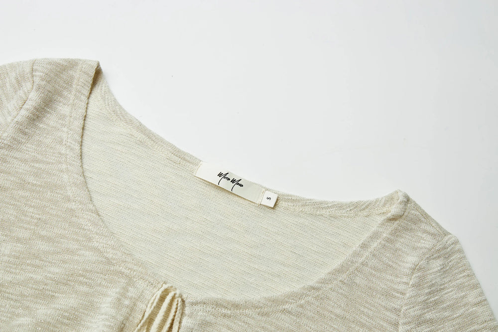 An image of a   21823 Sheer Knit Top by  Mirra Masa