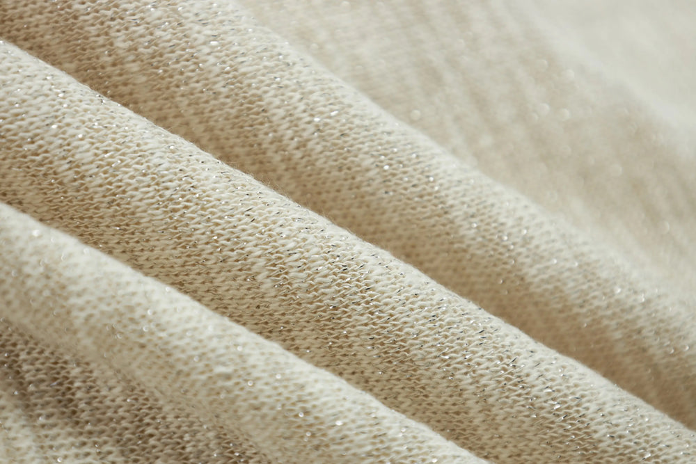 An image of a   21823 Sheer Knit Top by  Mirra Masa