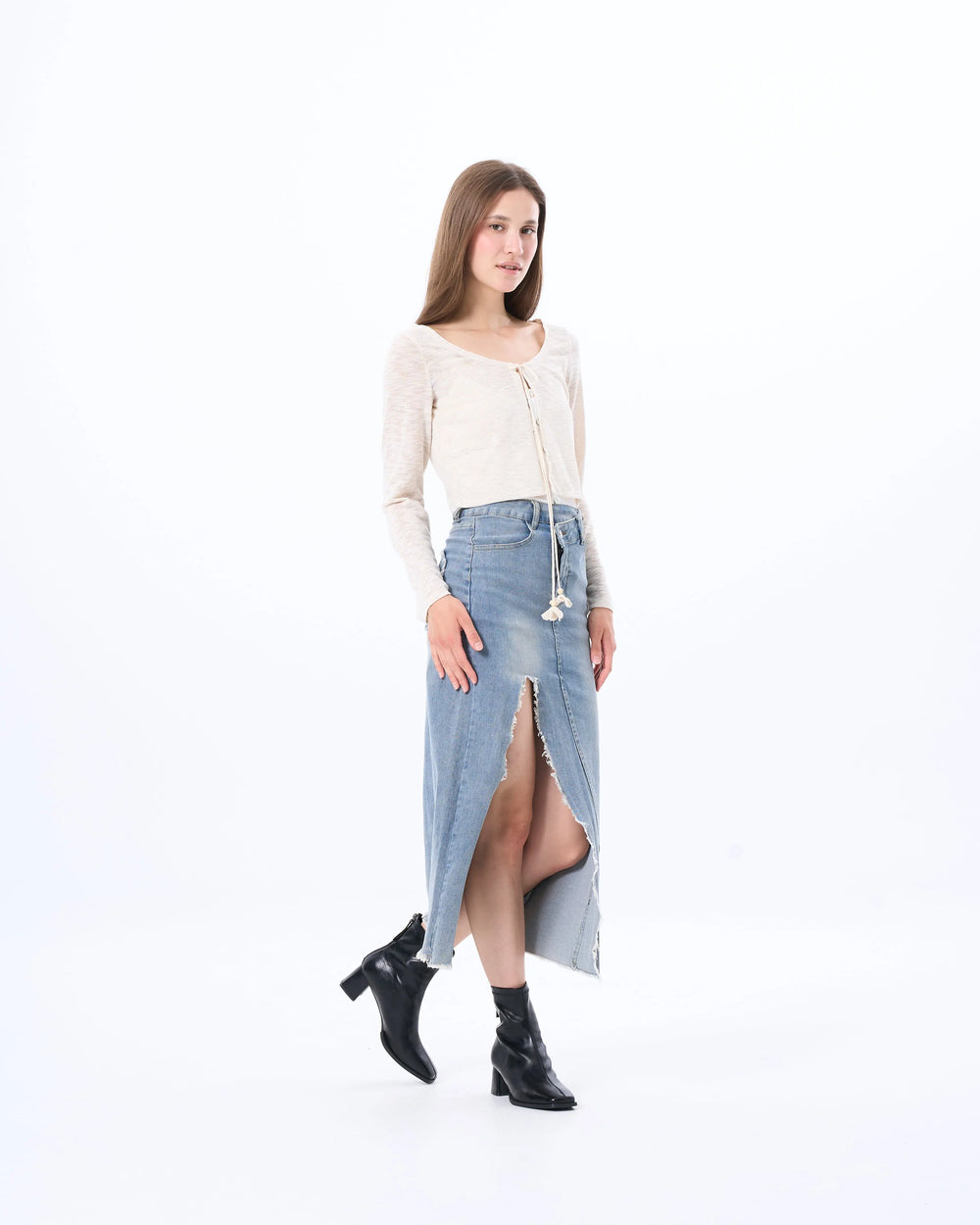 An image of a   21823 Sheer Knit Top by  Mirra Masa
