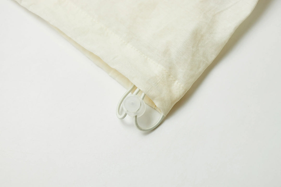 An image of a   21834 Sun Hoodie by  Mirra Masa
