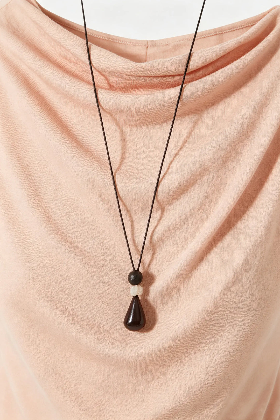 An image of a   21845 Draped Off-Shoulder Tee by  Mirra Masa