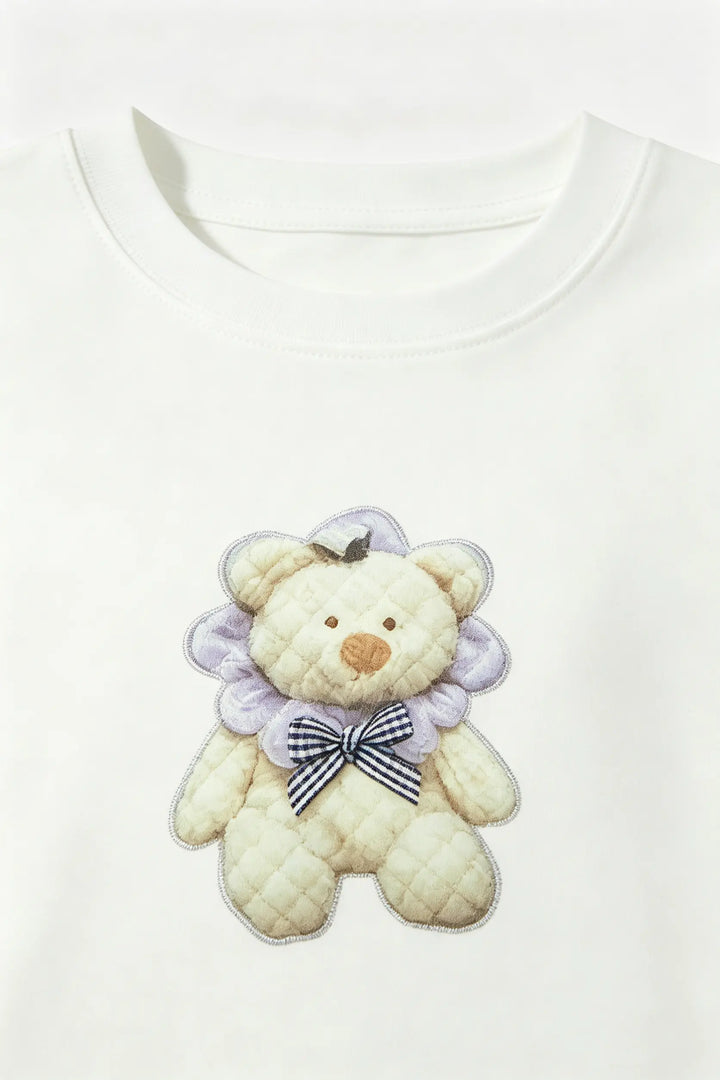 An image of a   21865 Embroidered Teddy Graphic Tee by  Mirra Masa