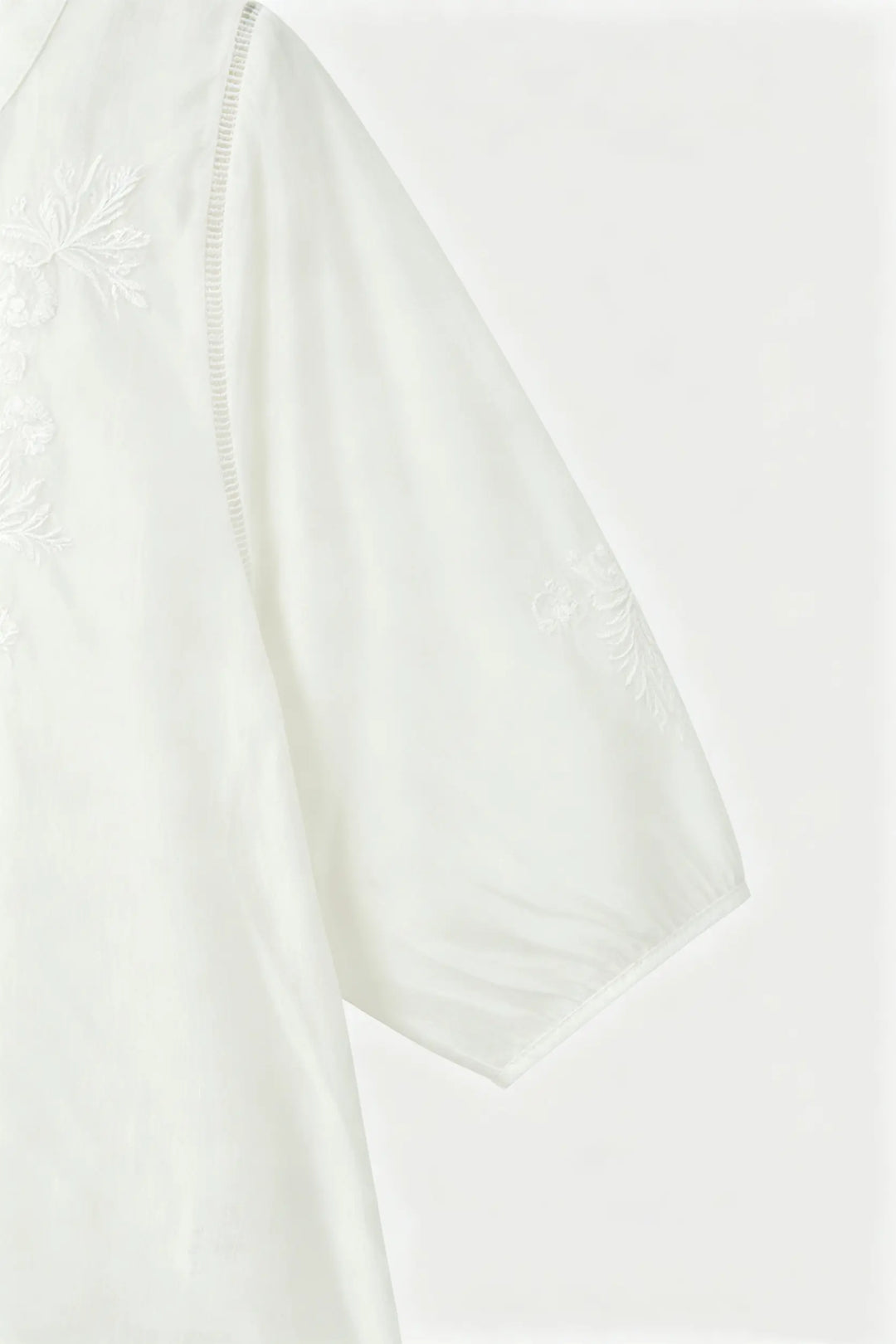 An image of a   21879 Embroidered V-Neck Blouse by  Mirra Masa