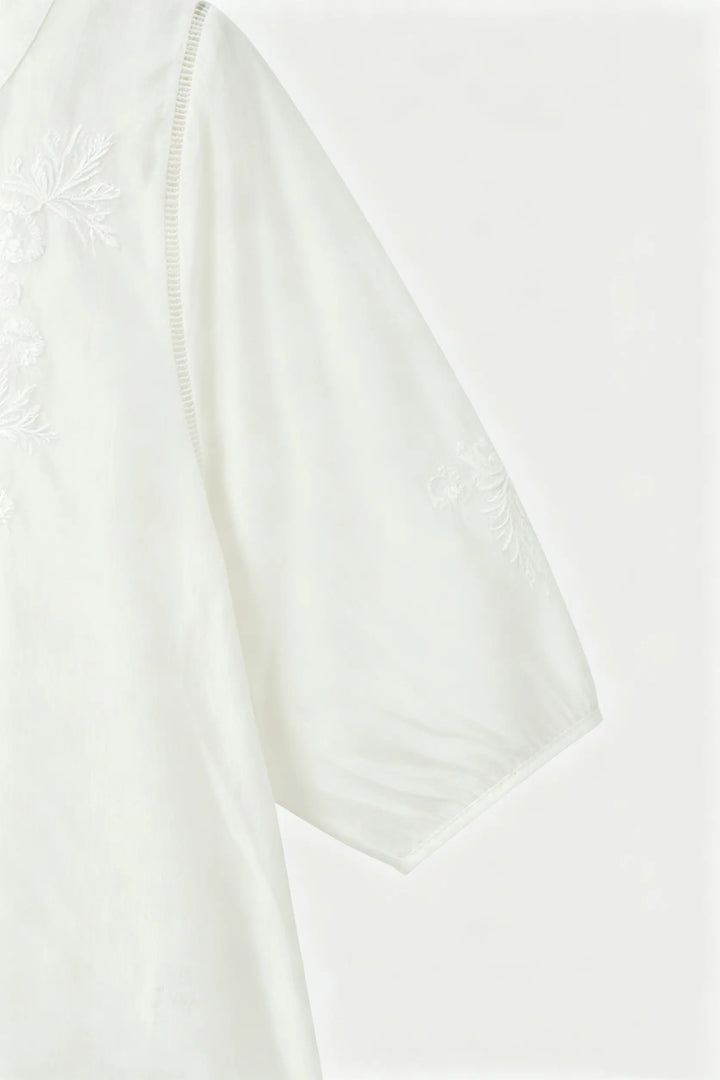 An image of a   21879 Embroidered V-Neck Blouse by  Mirra Masa