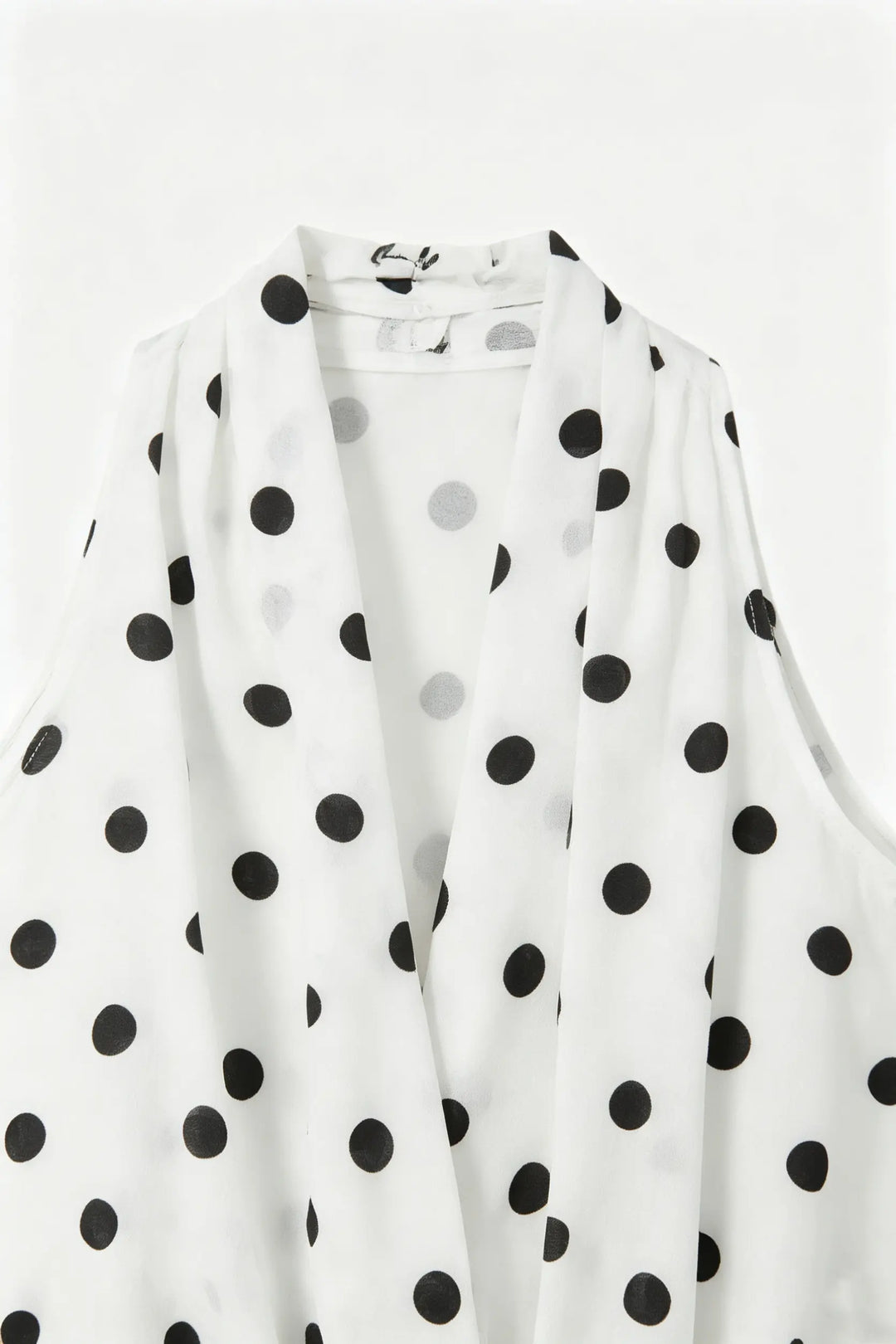 An image of a   21890 Dotted Halter Wrap Top by  Mirra Masa