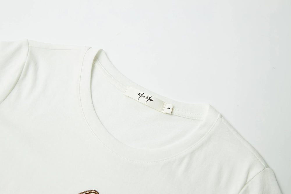 An image of a   21999 Tropical Graphic Tee by  Mirra Masa