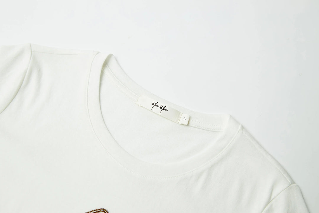 An image of a   21999 Tropical Graphic Tee by  Mirra Masa