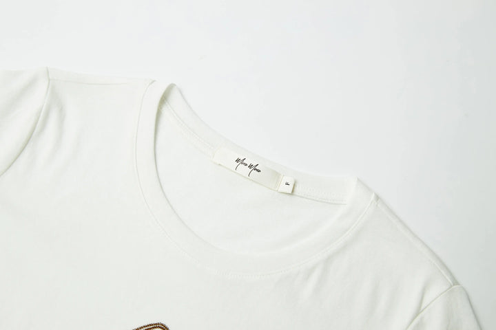 An image of a   21999 Tropical Graphic Tee by  Mirra Masa