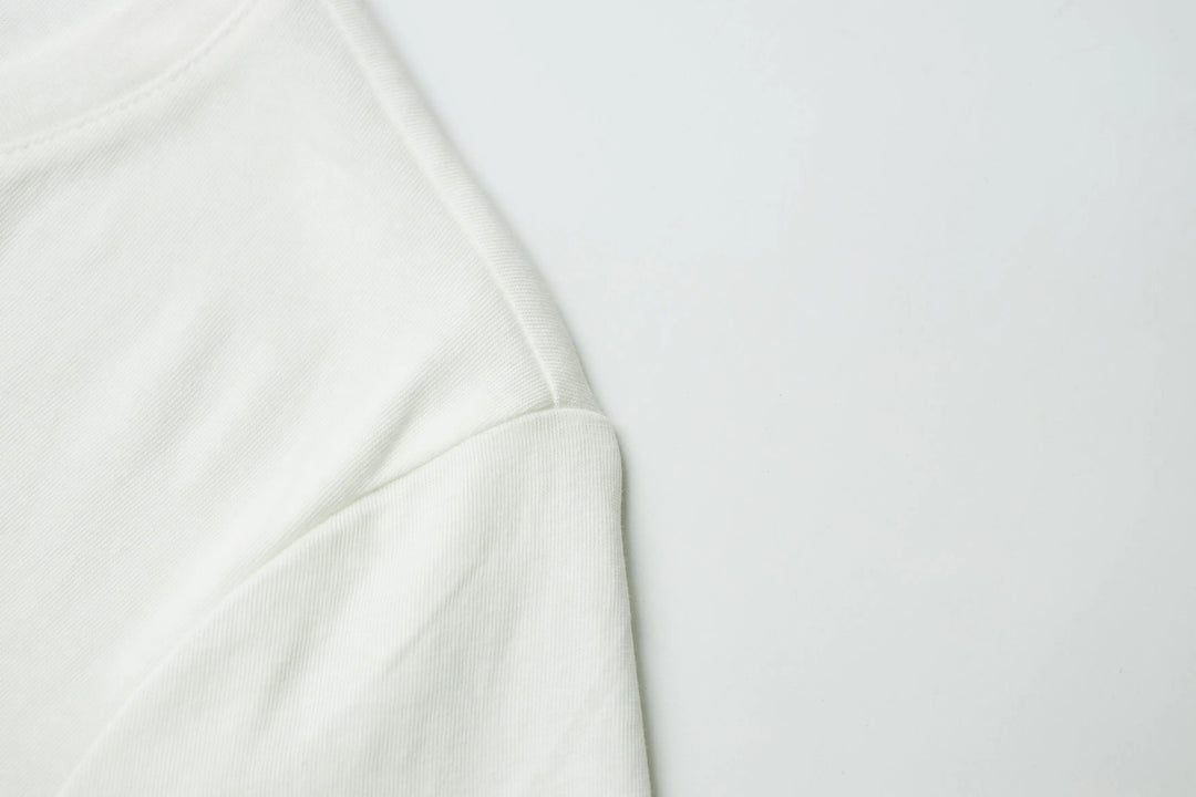 An image of a   21999 Tropical Graphic Tee by  Mirra Masa