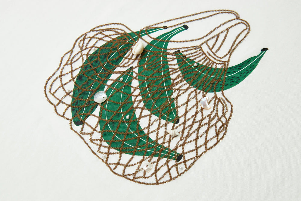 An image of a   21999 Tropical Graphic Tee by  Mirra Masa