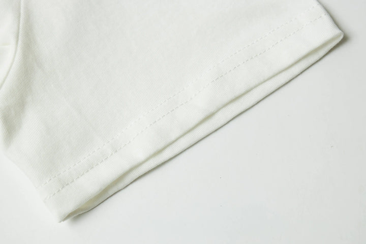 An image of a   21999 Tropical Graphic Tee by  Mirra Masa
