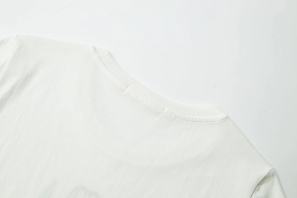 An image of a   21999 Tropical Graphic Tee by  Mirra Masa