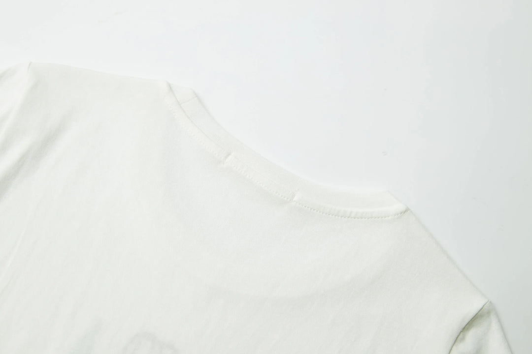 An image of a   21999 Tropical Graphic Tee by  Mirra Masa