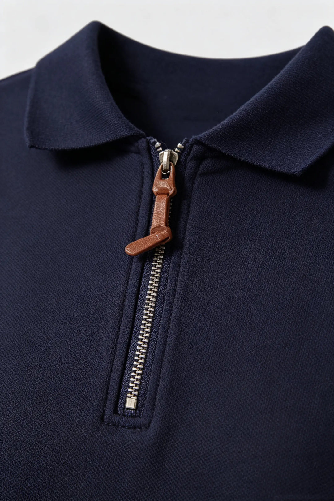 An image of a   23674 Court Zip Polo Mini Dress by  Mirra Masa