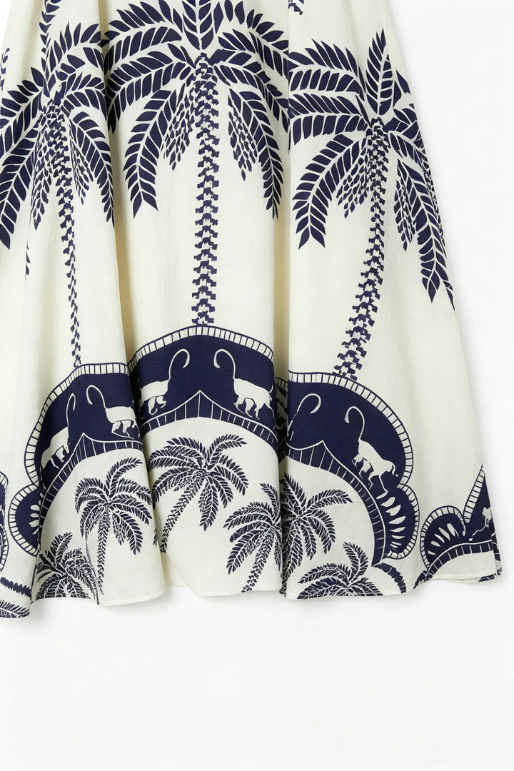 An image of a   23754 Indigo Flora Cinch Midi Dress by  Mirra Masa
