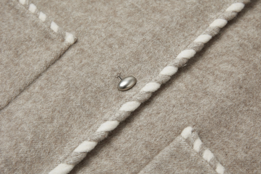 An image of a   2684Q Trimmed Wool Jacket by  Mirra Masa