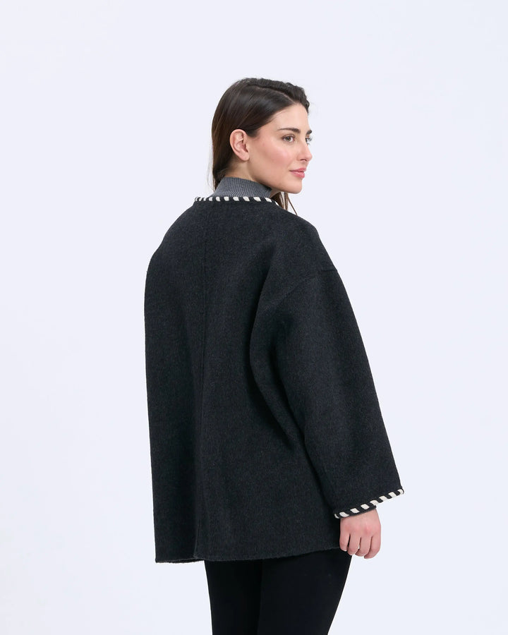 An image of a   2684Q Trimmed Wool Jacket by  Mirra Masa