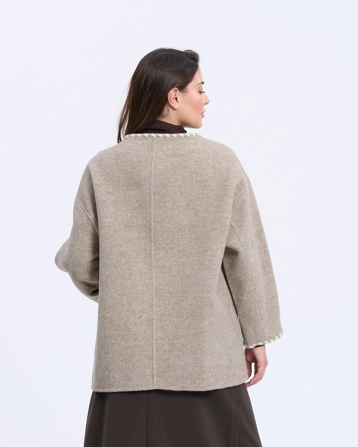 An image of a   2684Q Trimmed Wool Jacket by  Mirra Masa