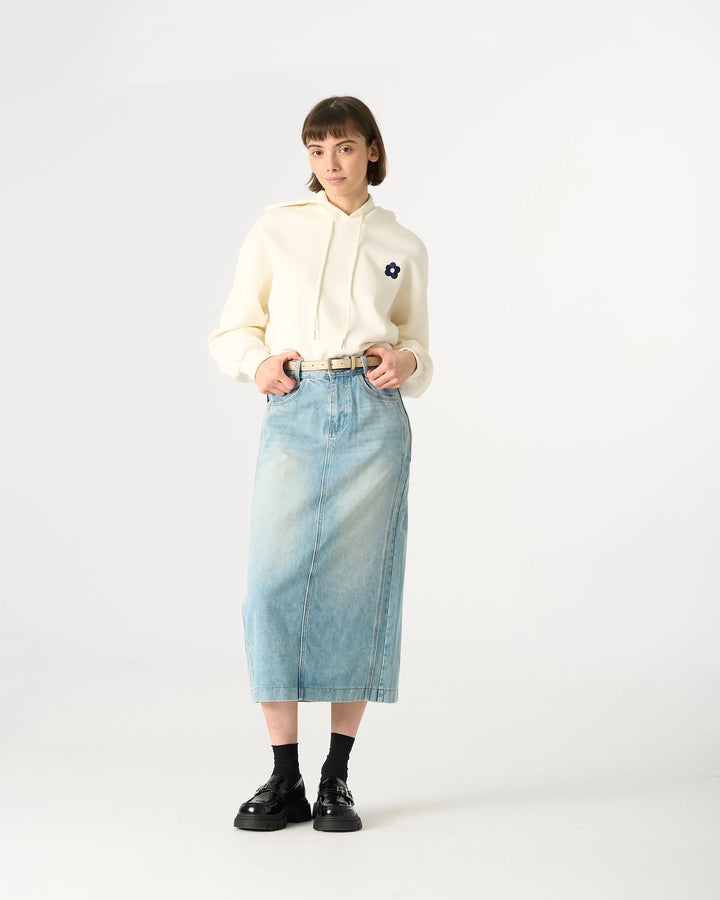 An image of a  Washed Blue / 30 30474 Denim Midi Skirt by  Mirra Masa