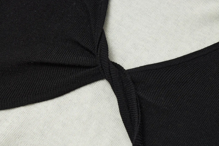 An image of a   31031 Layered Knit Top by  Mirra Masa