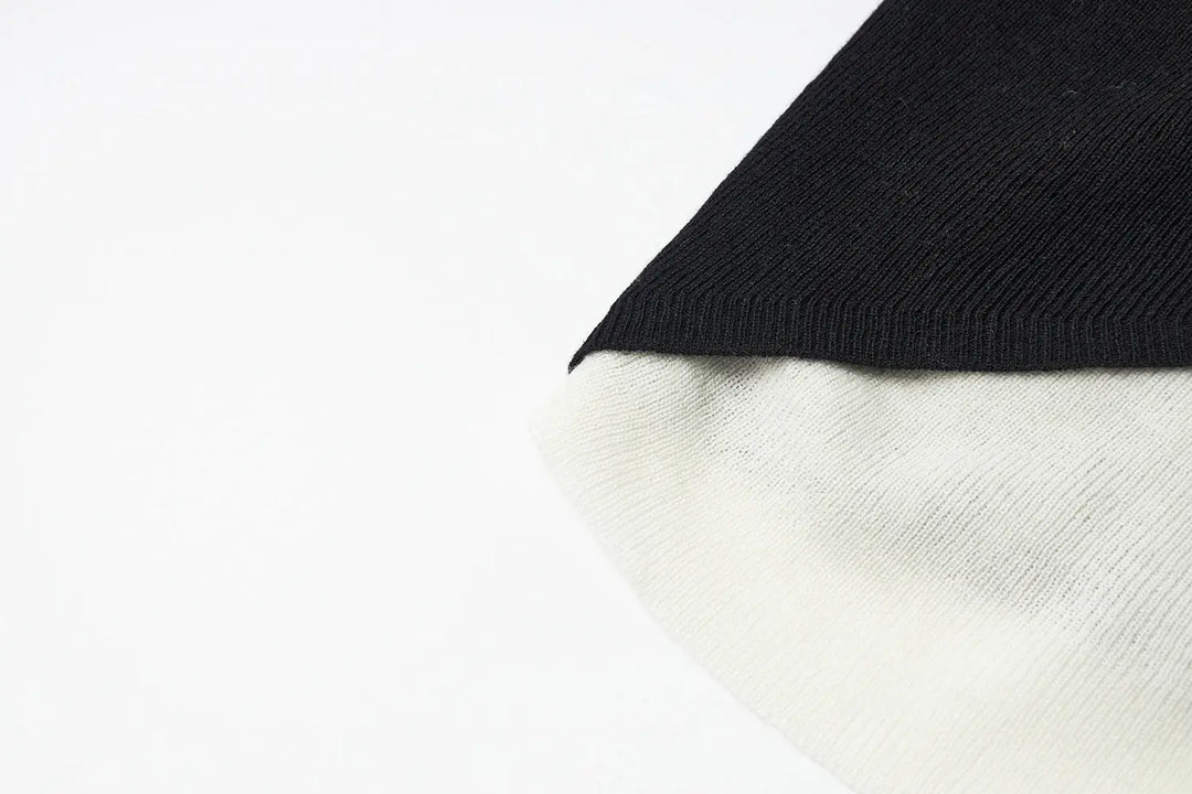 An image of a   31031 Layered Knit Top by  Mirra Masa