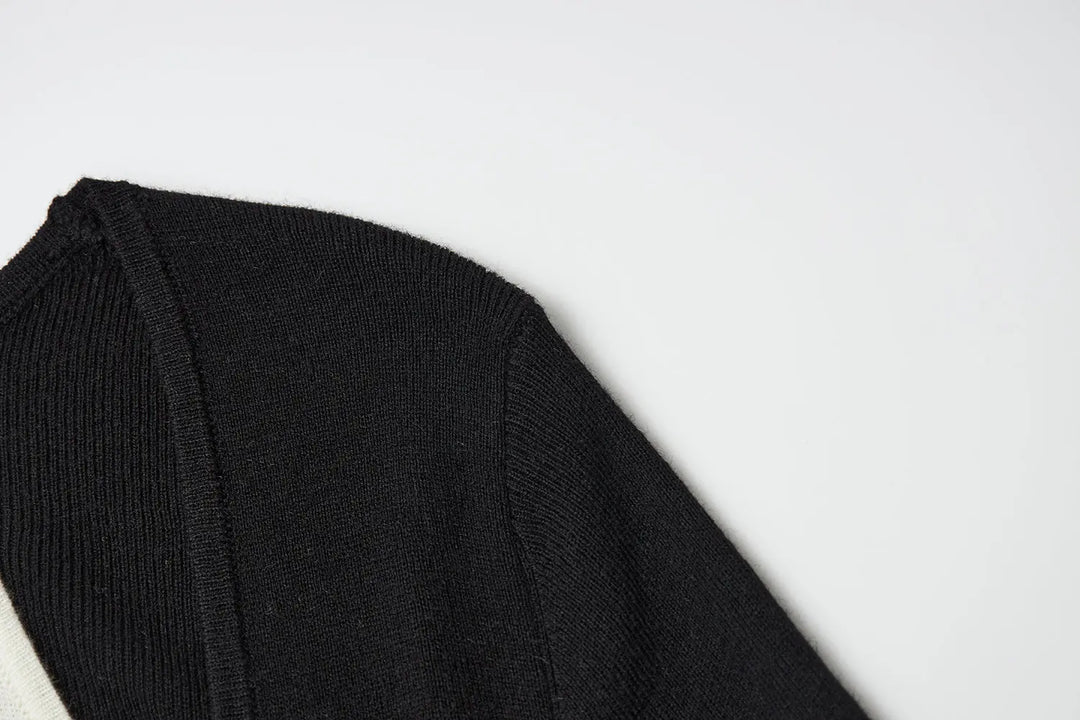 An image of a   31031 Layered Knit Top by  Mirra Masa