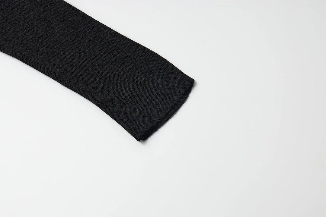 An image of a   31031 Layered Knit Top by  Mirra Masa